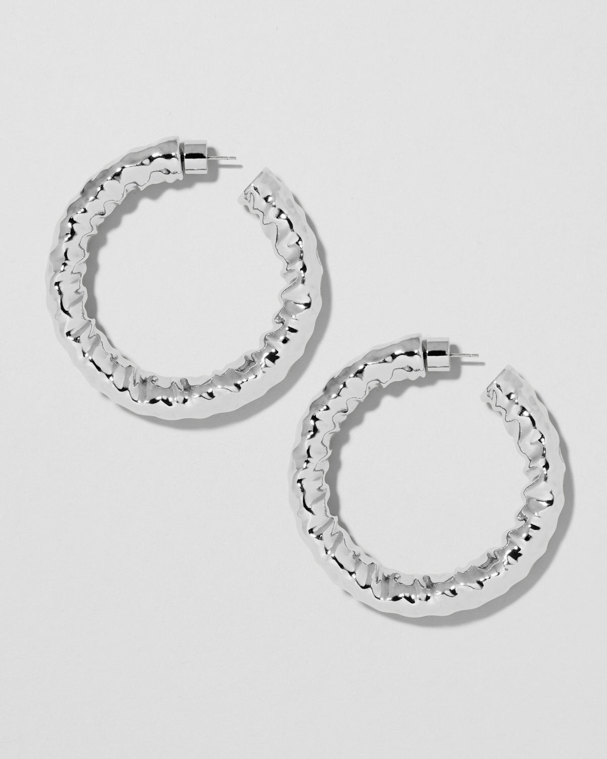1.5" Maeve Baby Hoops gold earring - styled on model | hoop earrings