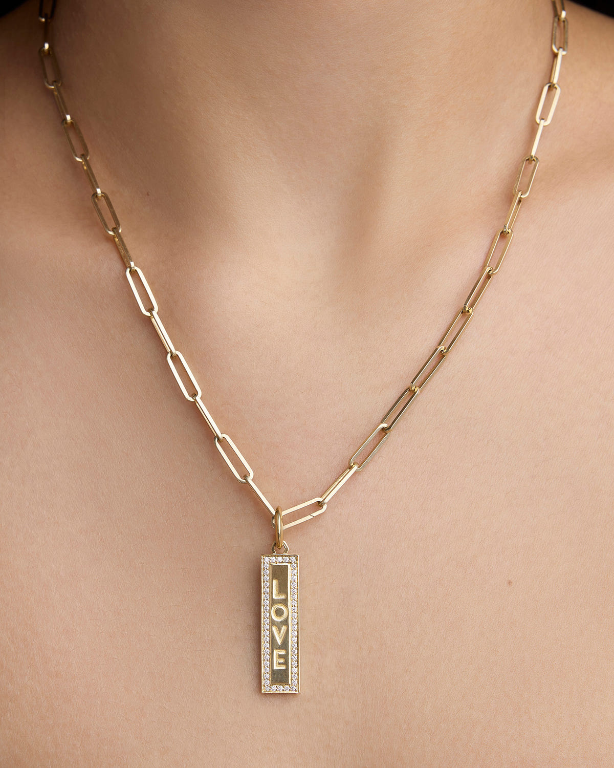 Personalized Luxe Narrow Classic Dog Tag in 18K Yellow Gold charm - close-up detail | charm necklaces
