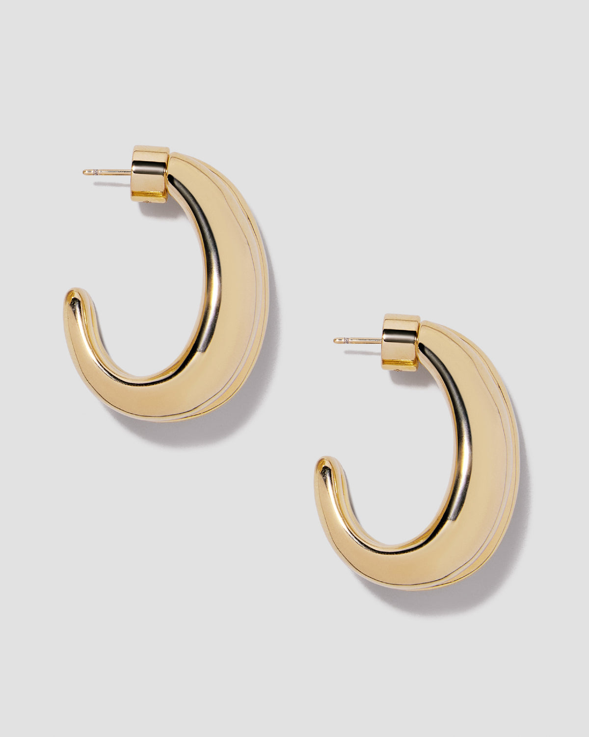 Chavez Huggies earring - alternate angle | gold huggie earrings