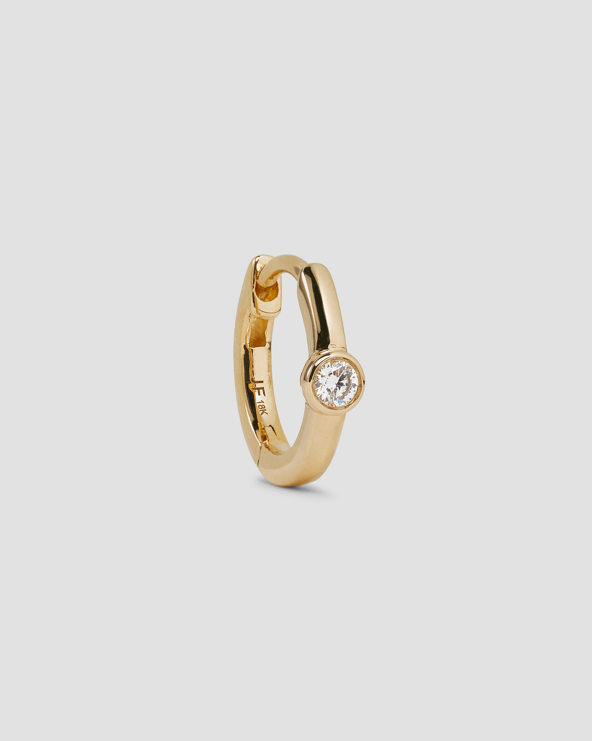 18K Essential Single Stone Tiny Huggie gold earring - side view | diamond huggie earrings