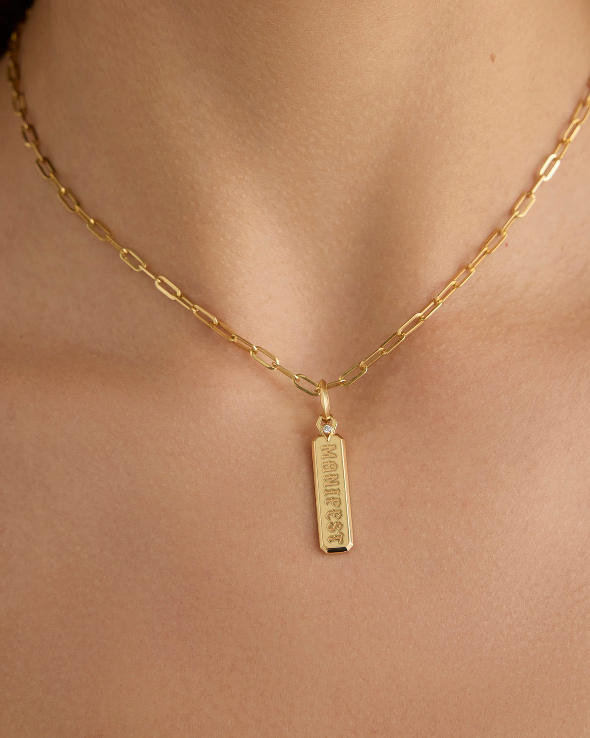 Small Mama Dog Tag in 18K Yellow gold charm - close-up detail | charm necklaces
