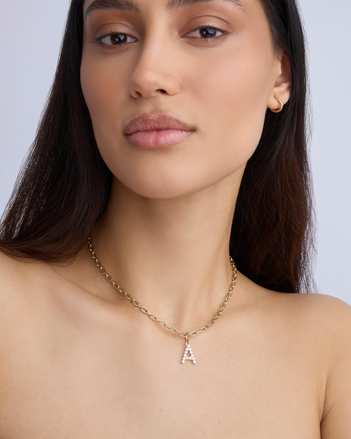 Medium Floating Diamond Minimal Block Letter 18K gold charm - close-up detail | necklace with charms