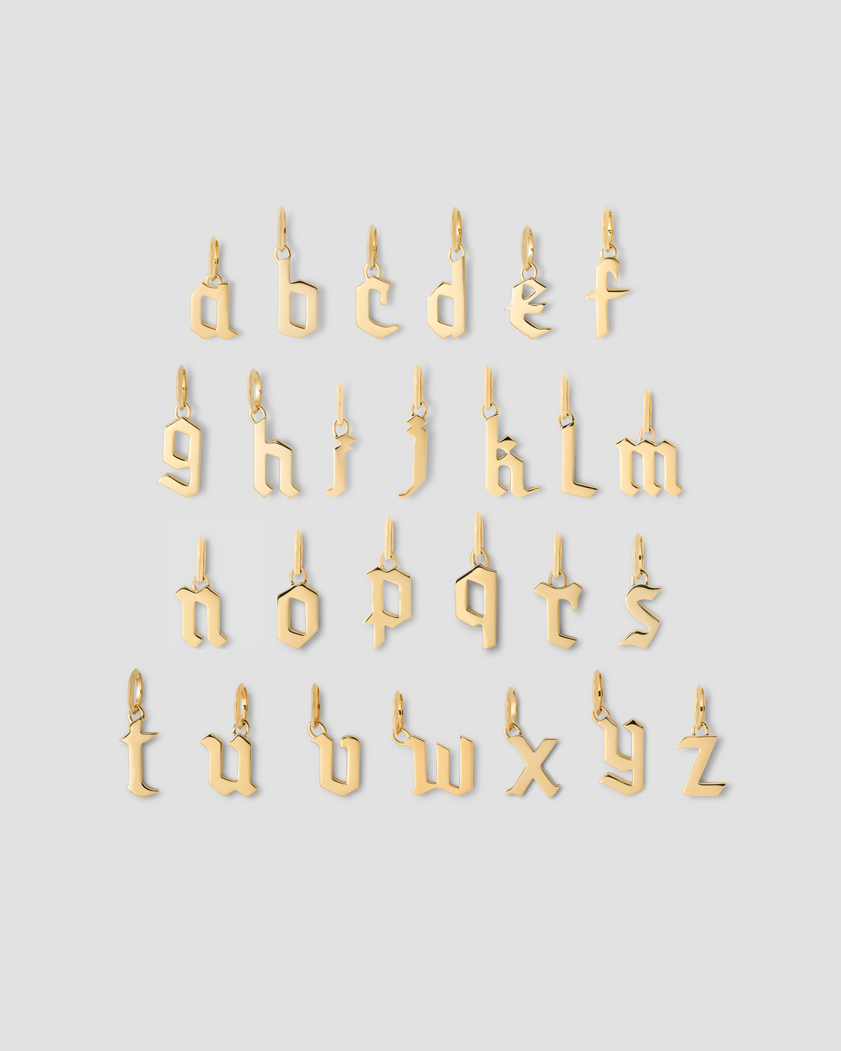 Lower Case Gothic Letter Charm in 14K Yellow Gold 14K gold charm - styled on model | charm necklaces