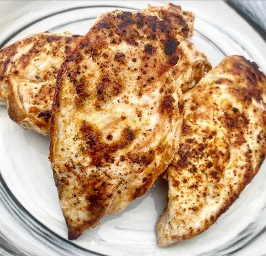 Three breasts of grilled chicken. 