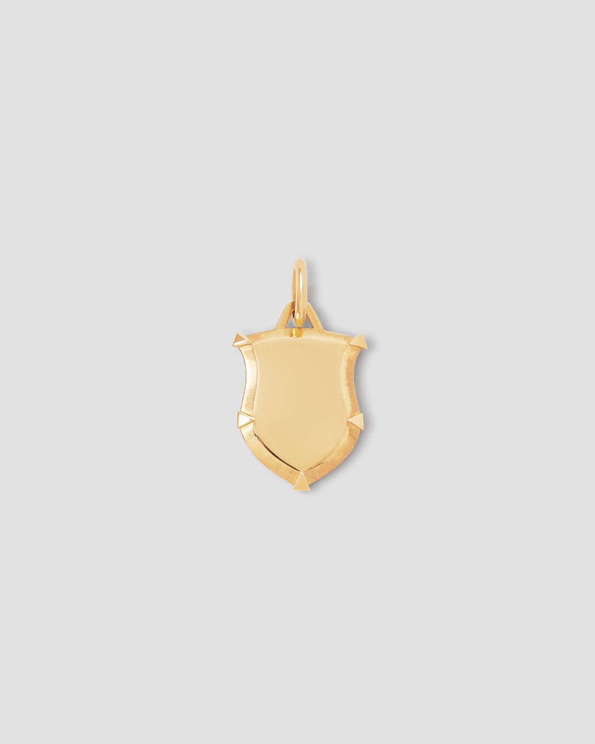 Mini Classic Shield in 18K Yellow Gold charm - front view | gold charm necklace