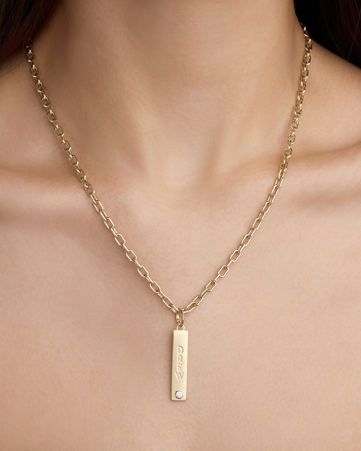 Personalized Narrow Classic Diamond Dog Tag in 18K Yellow gold charm - close-up detail | necklace with charms
