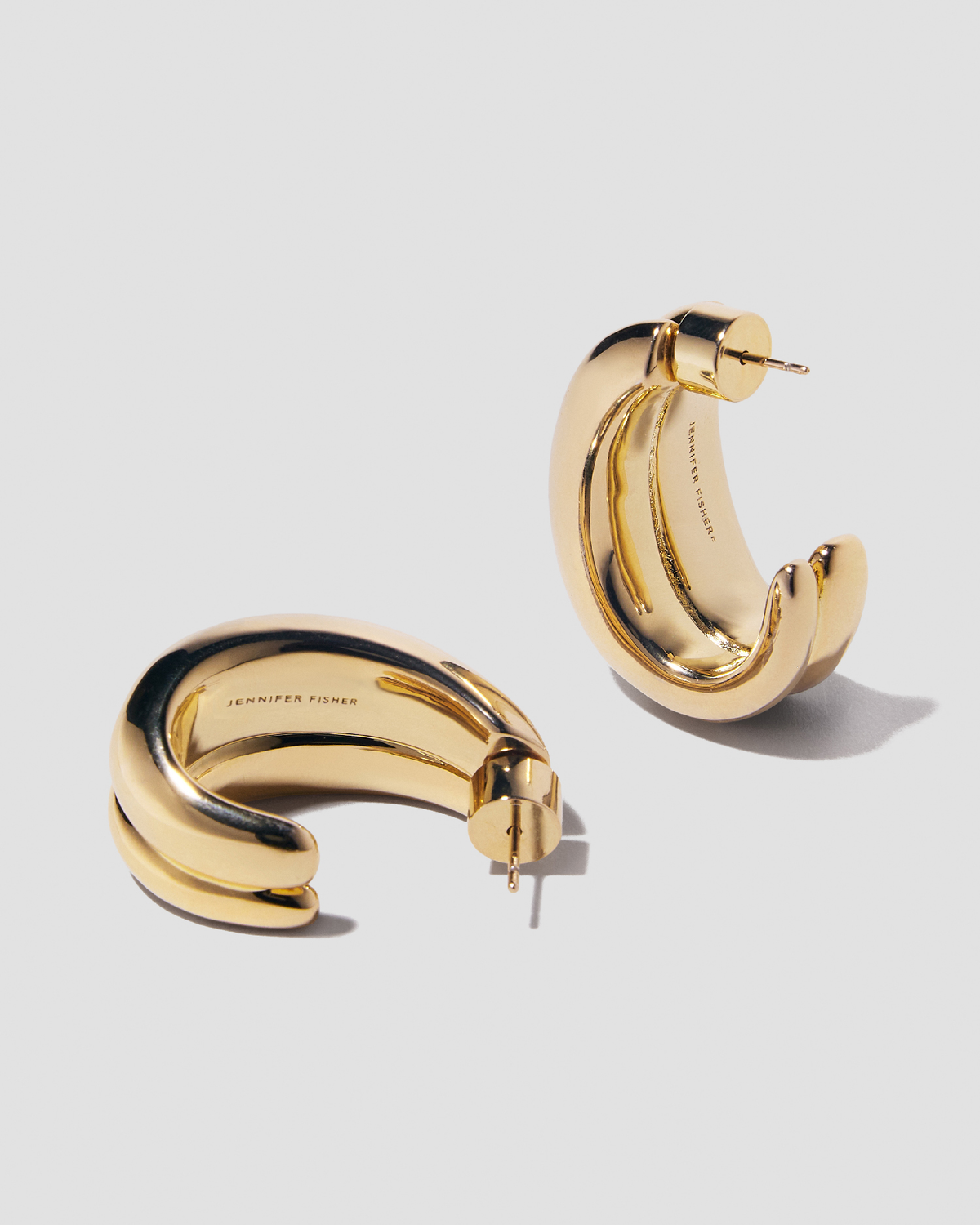 Chavez Huggies earring - styled on model | gold huggie earrings