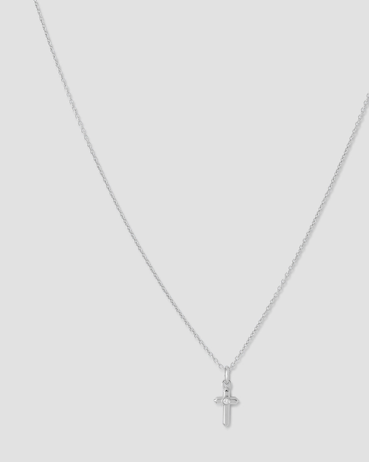 Cross Necklace gold charm - alternate angle | necklace with charms
