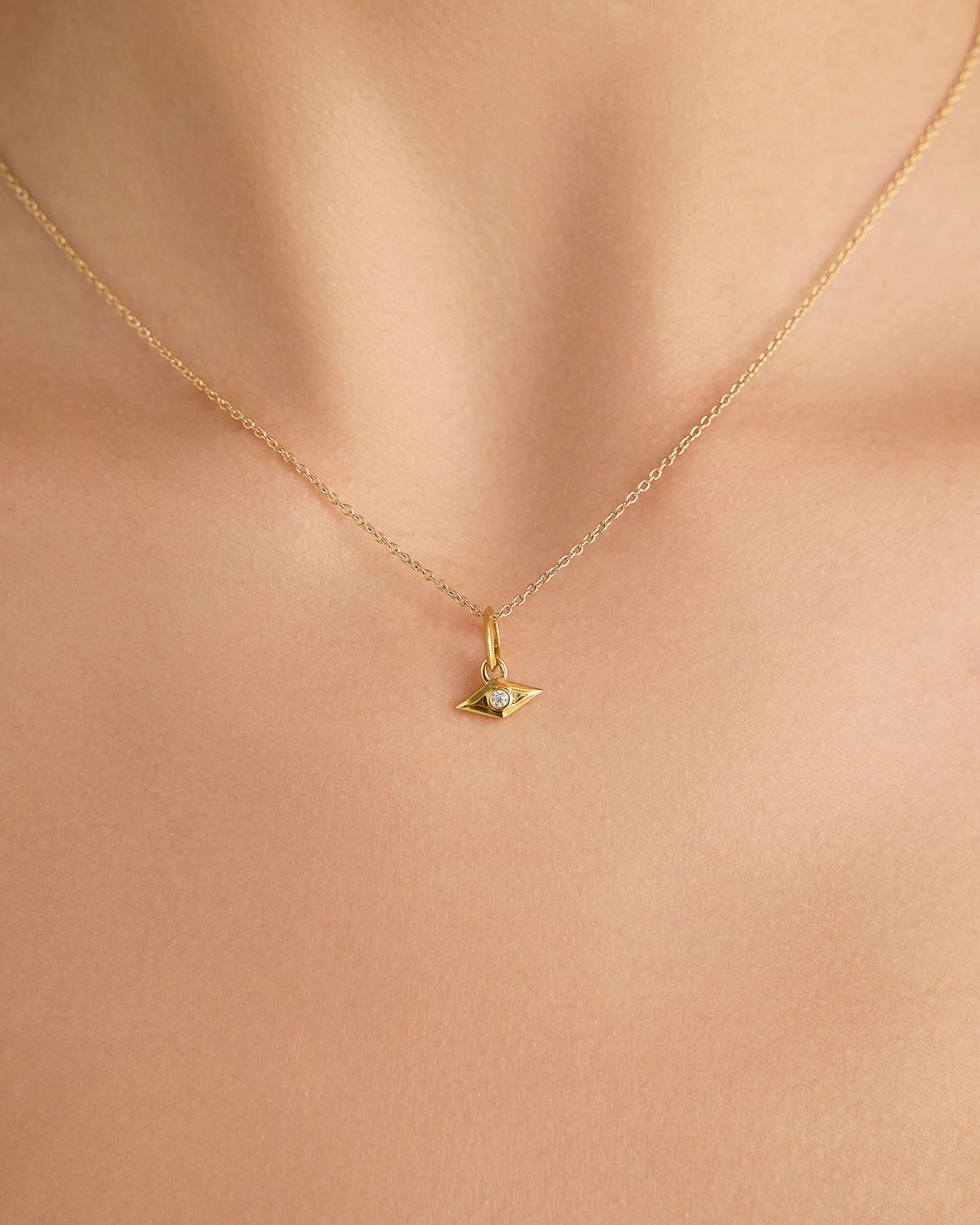 Evil Eye Necklace gold charm - close-up detail | necklace with charms