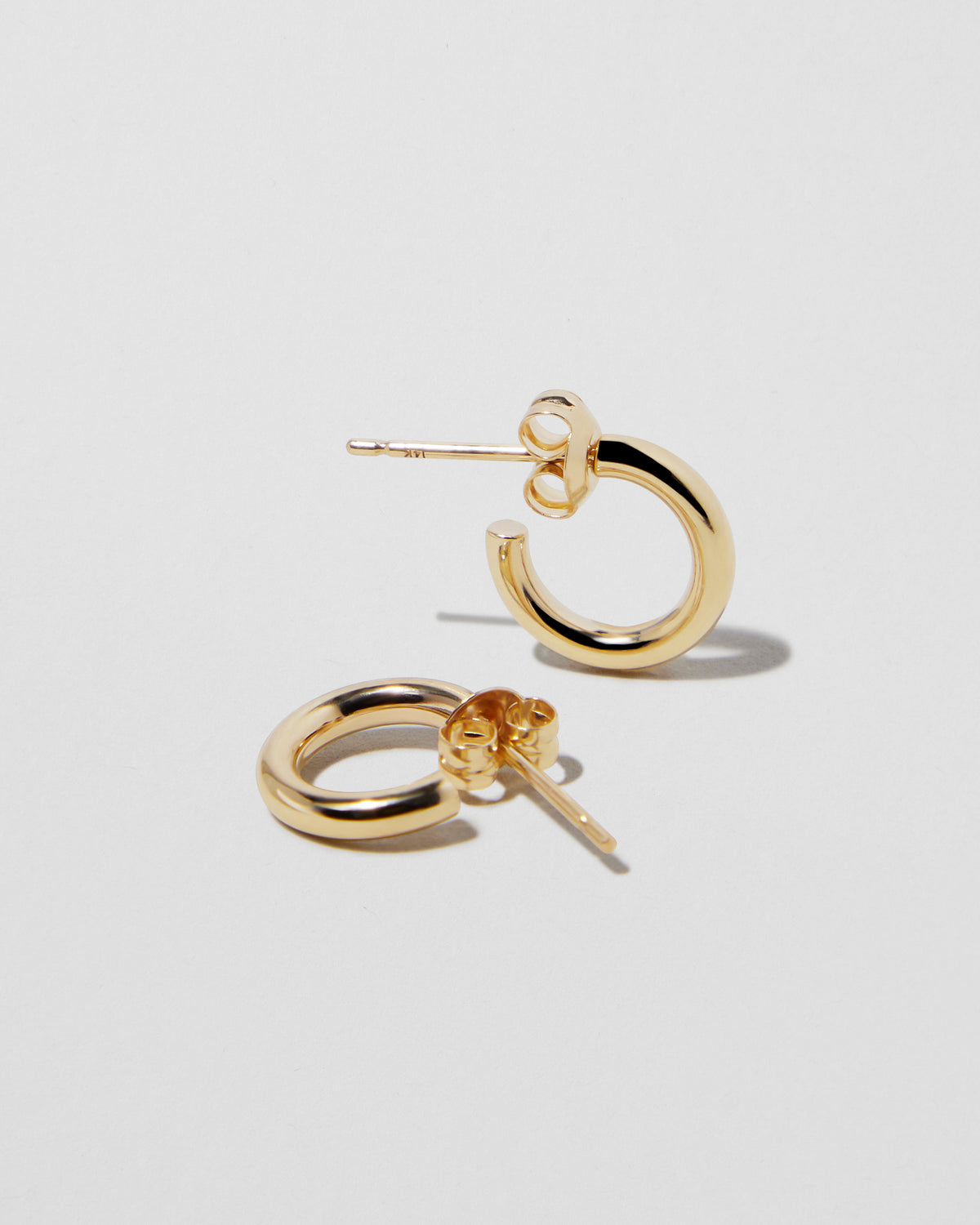 Micro Thread Huggies in 14K Yellow Gold 18K gold earring - front view | threaded earrings