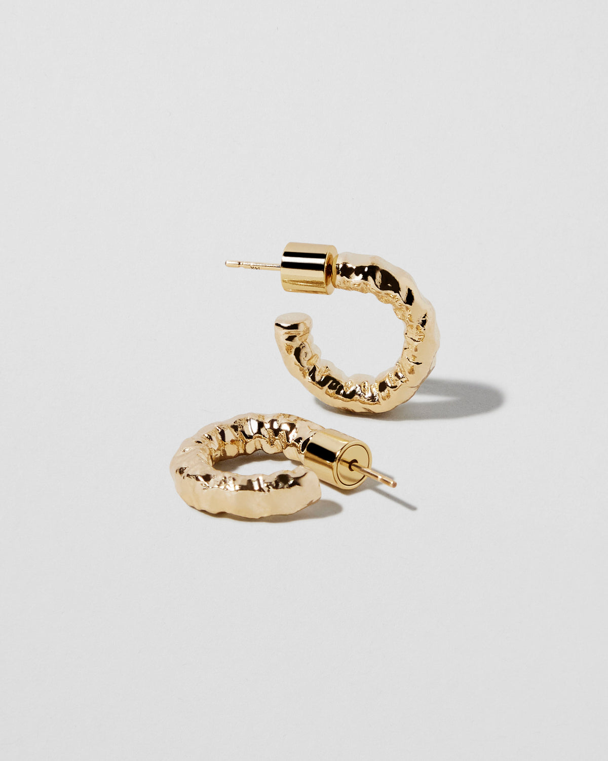Hailey Micro Huggies earring - close-up detail | gold huggie earrings