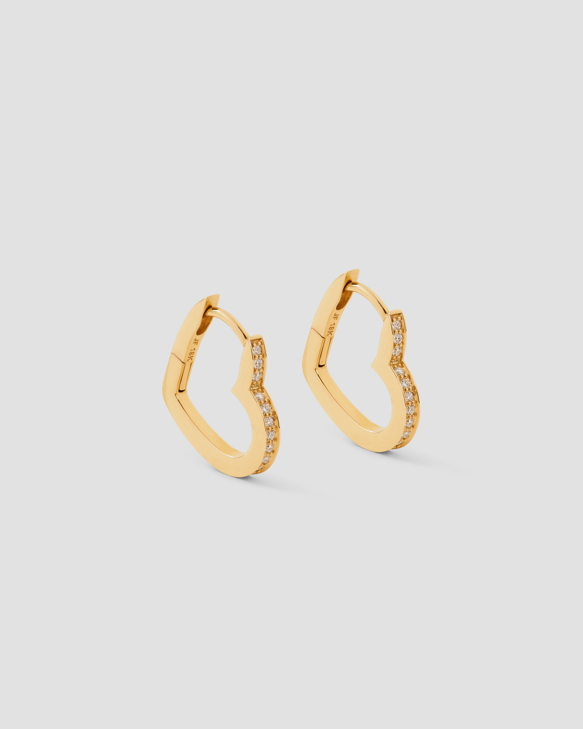 18k Small Heart Huggie With Pavé White Diamonds gold earring - front view | diamond huggie earrings