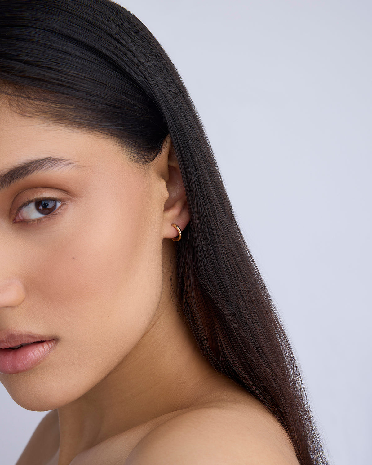 Micro Thread Huggies in 14K Yellow Gold 18K gold earring - close-up detail | threaded earrings