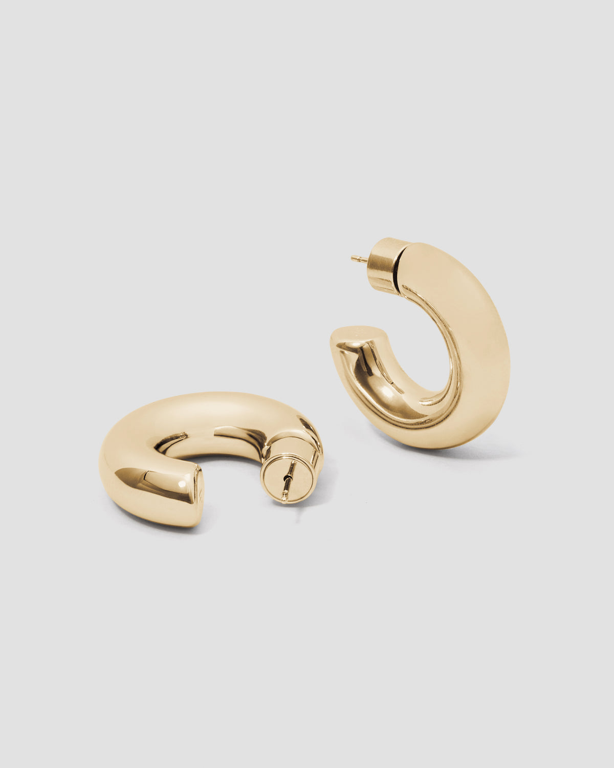 Jamma Micro Huggies earring - alternate angle | gold huggie earrings