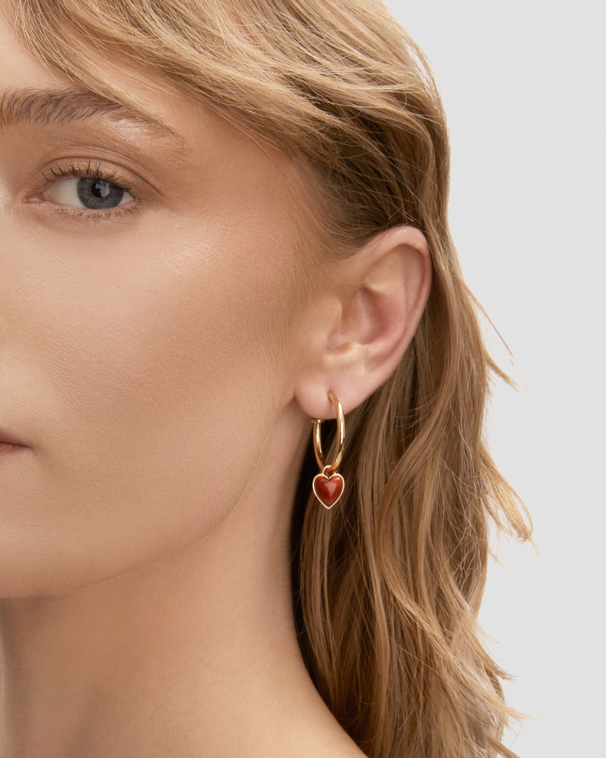 Semi-Precious Convertible Heart Huggies earring - side view | gold huggie earrings