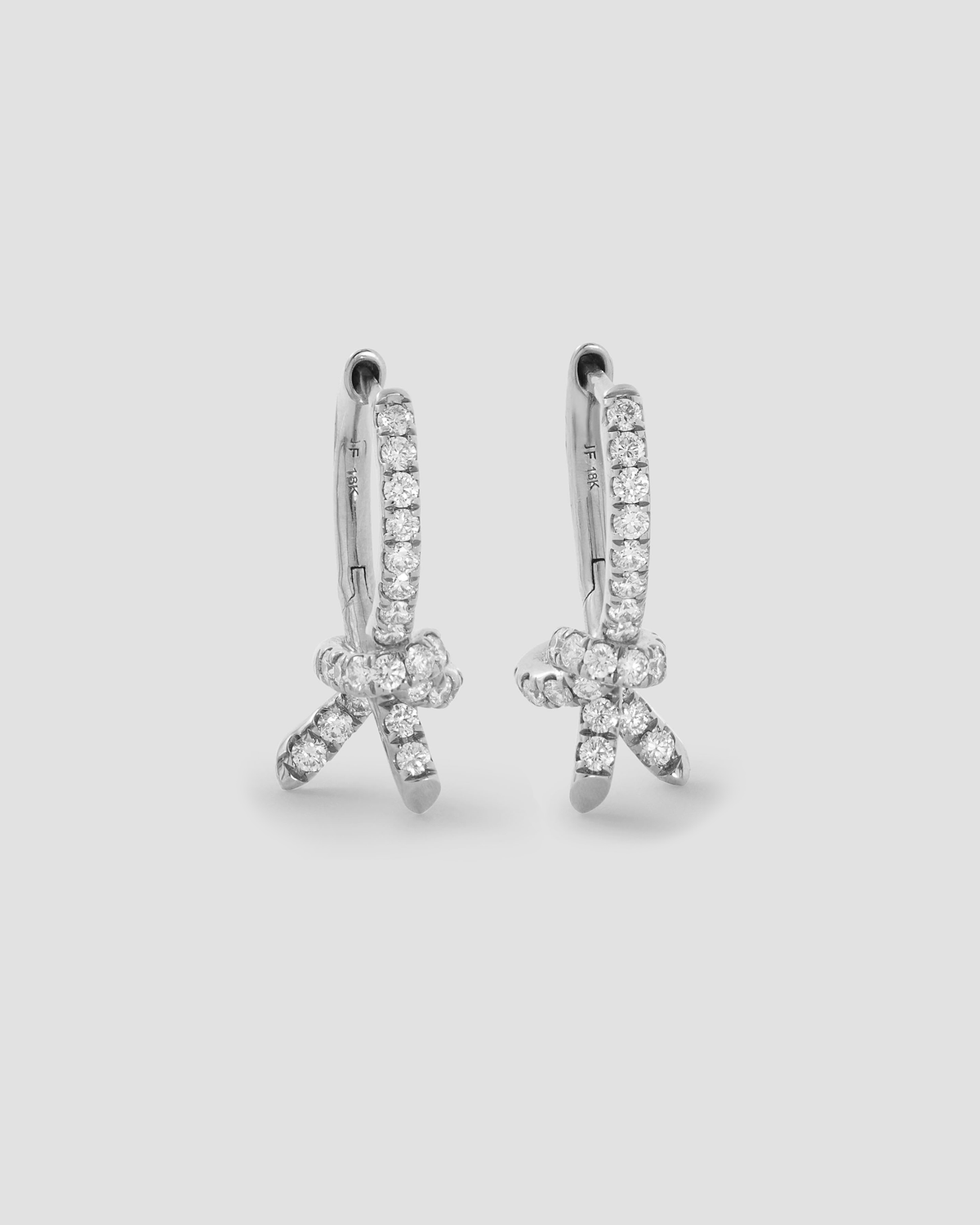 Knot Huggie with Pavé White Diamonds gold earring - back view | diamond huggie earrings