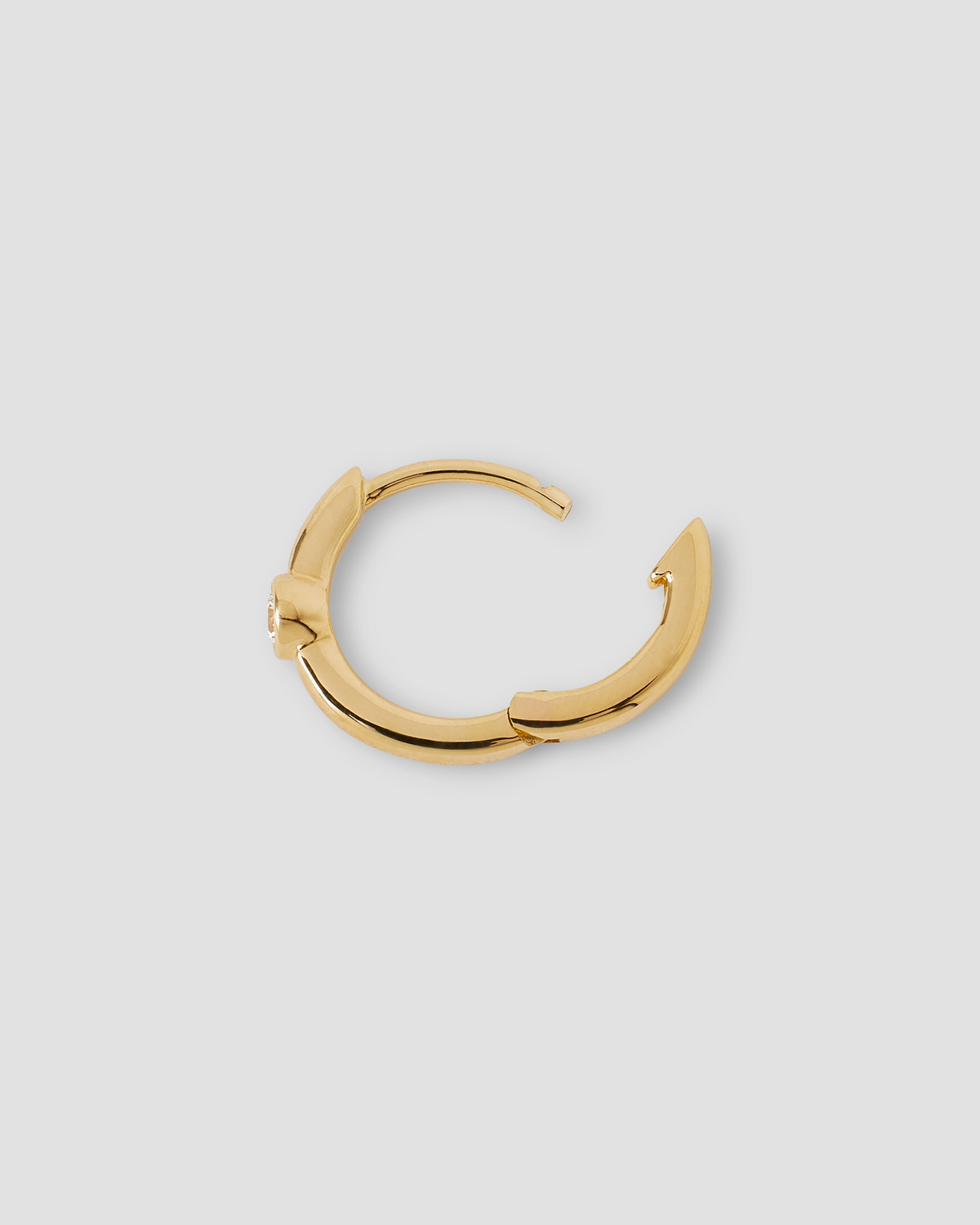 18K Essential Single Stone Tiny Huggie gold earring - worn look | diamond huggie earrings