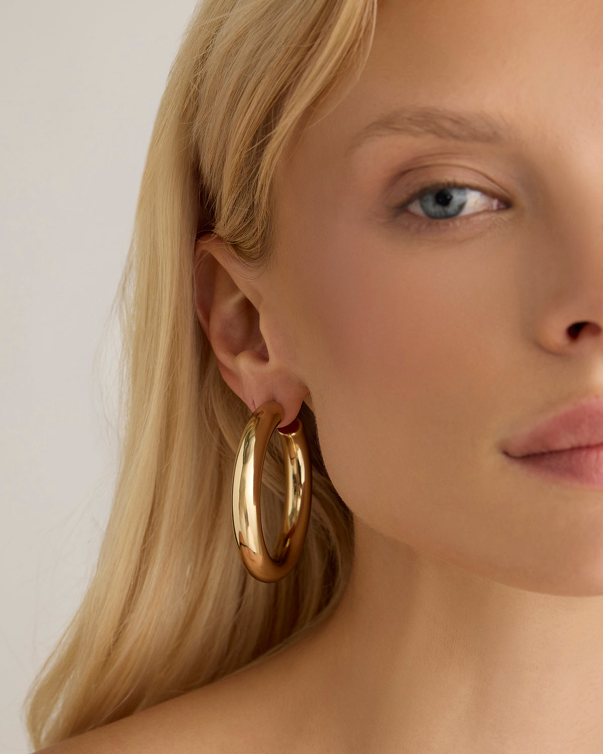 1.5" Jamma Baby Hoops gold earring - close-up detail | hoop earrings