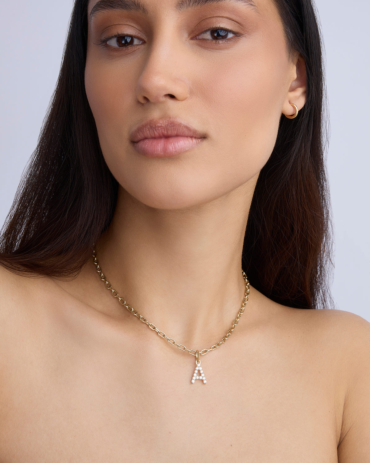 Medium Floating Diamond Minimal Block Letter 18K gold charm - close-up detail | necklace with charms