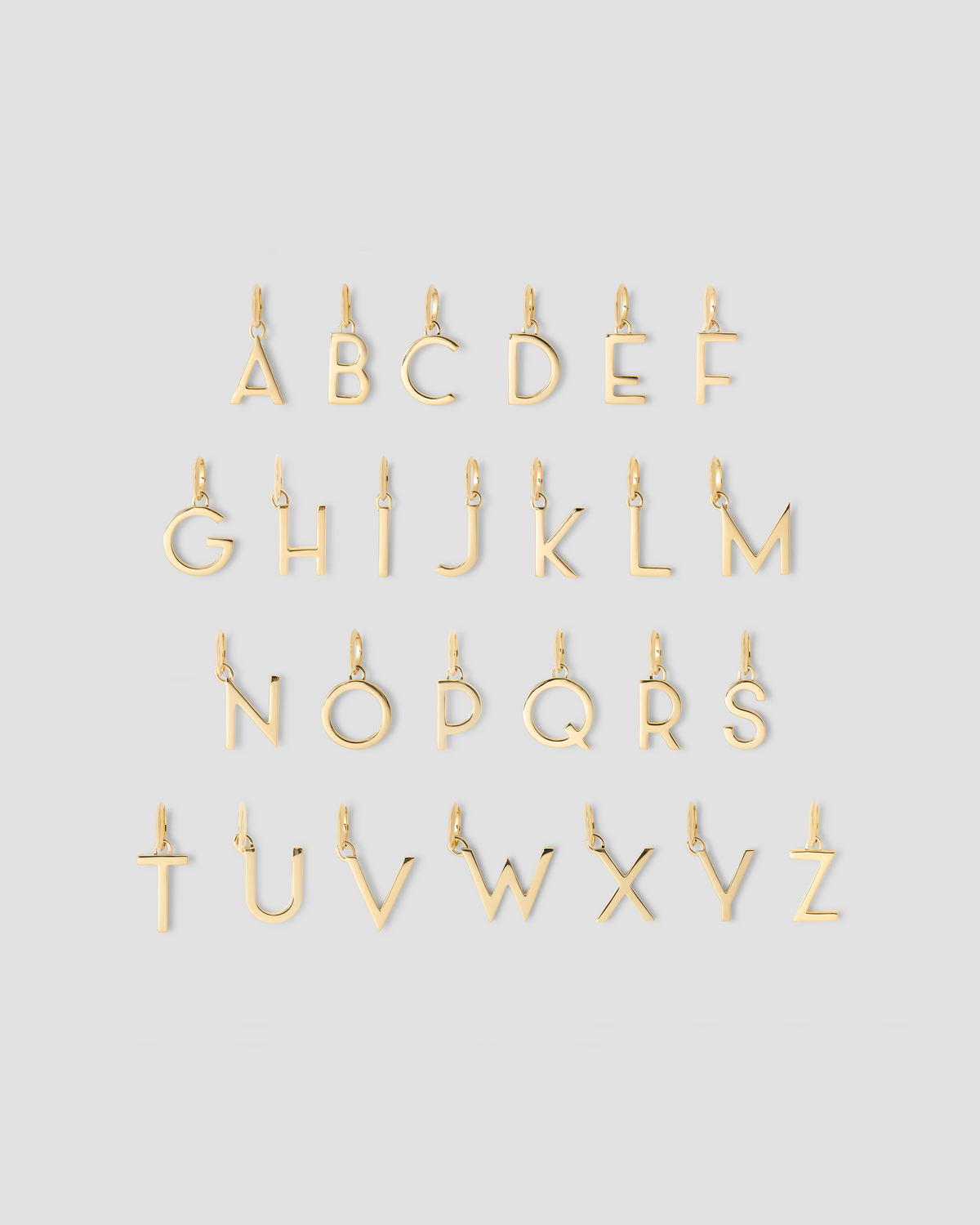 Minimal Block Letter Charm in 14K Yellow gold charm - close-up detail | custom charm necklace