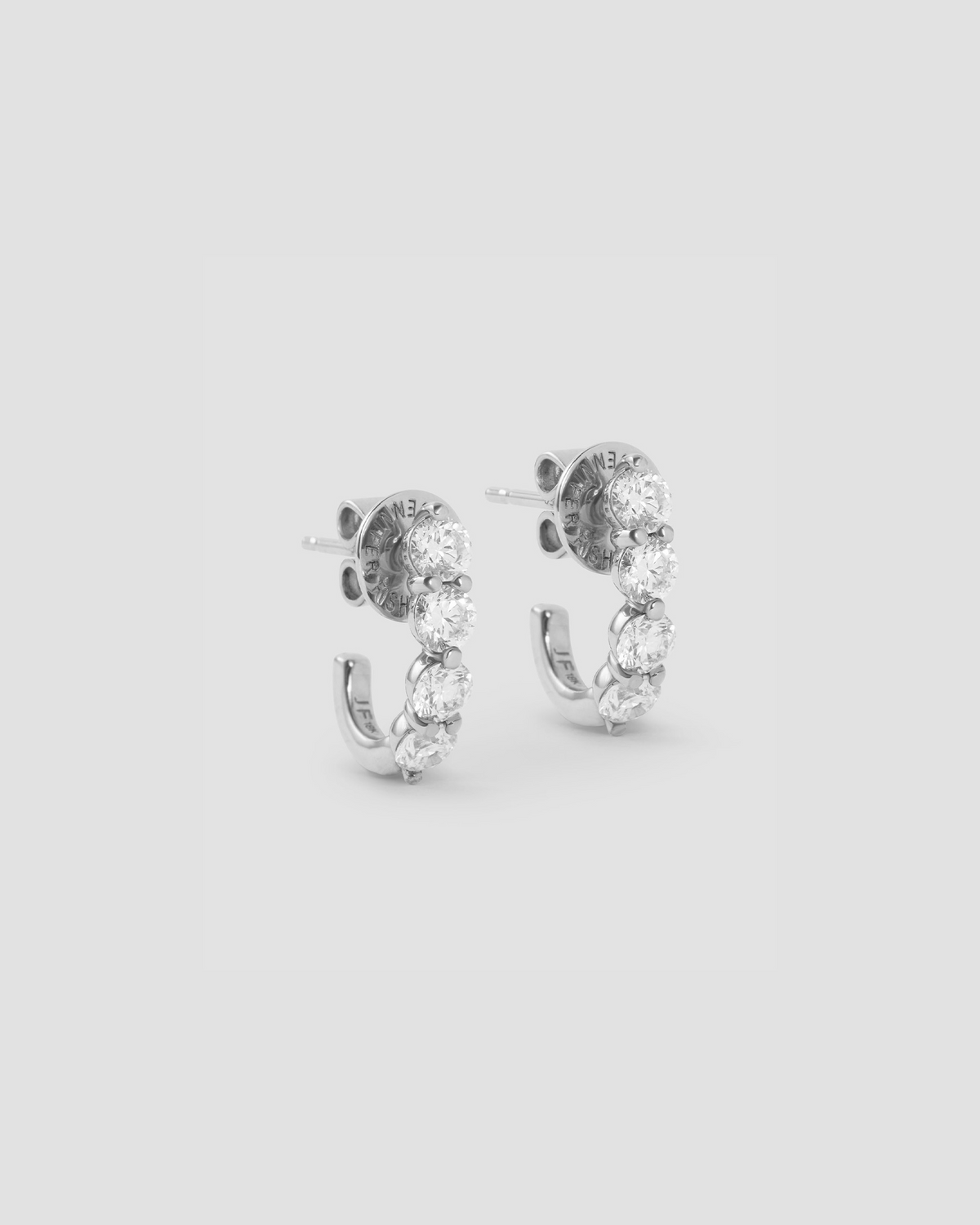 Floating Four Diamond Huggies gold earring - alternate angle | diamond huggie earrings