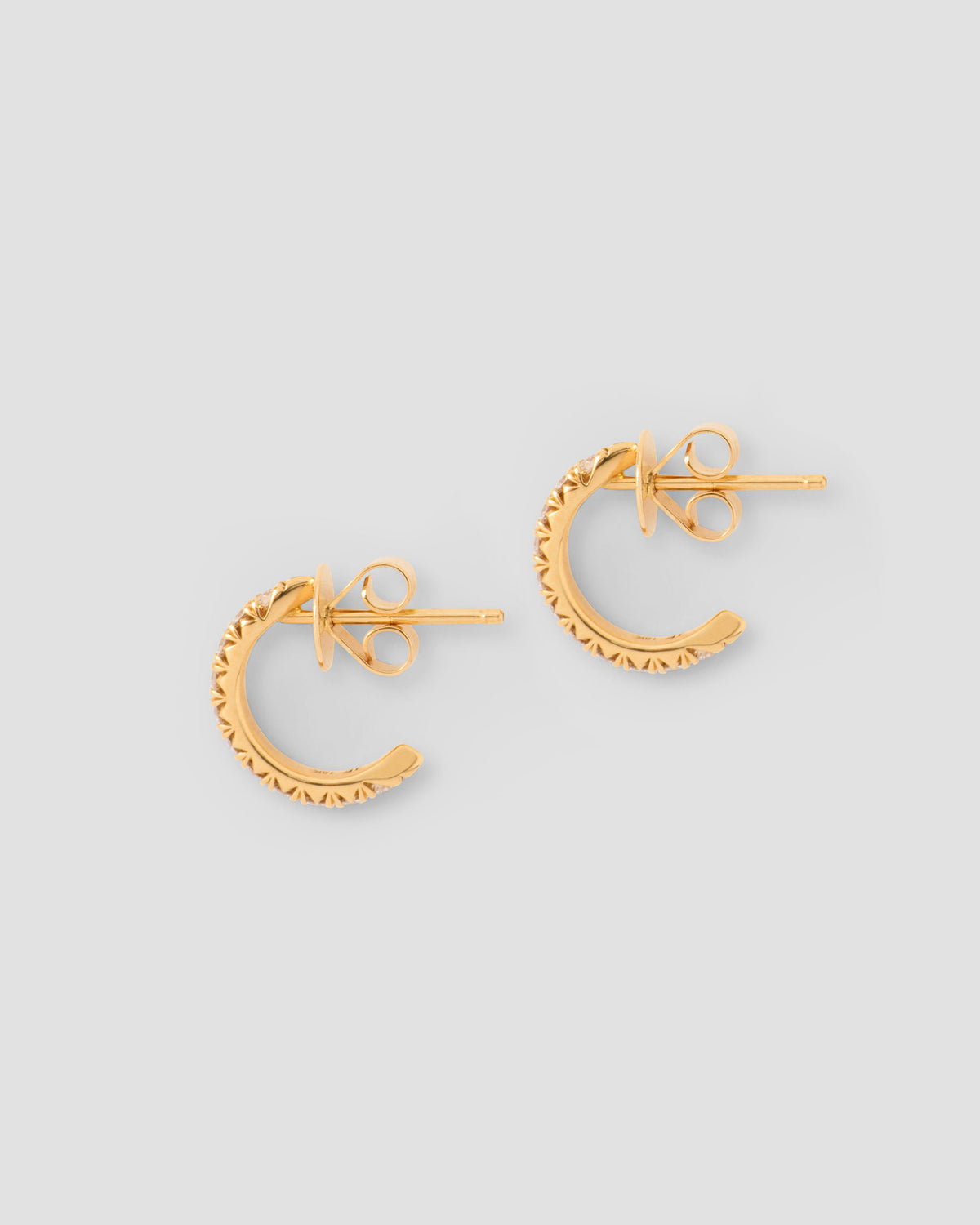 Pavé Diamond Pin Huggie in 18K Yellow Gold earring - styled on model | diamond huggie earrings