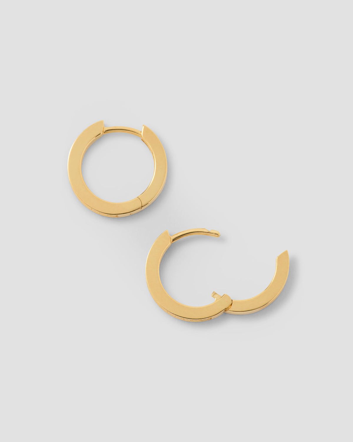 18k Small Huggie with Pavé Diamonds 18K gold earring - alternate angle | diamond huggie earrings