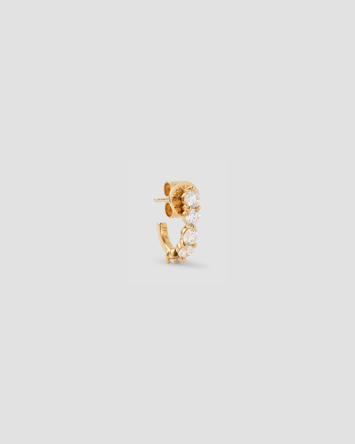 Floating Five Diamond Huggies 18K gold earring - styled on model | diamond huggie earrings