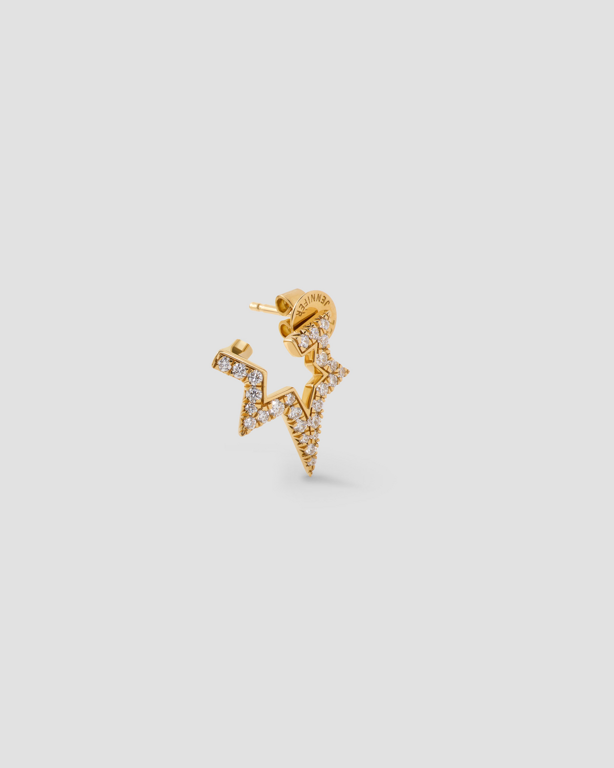 Large Star Earring with Pavé White Diamonds in 18k Yellow Gold earring - styled on model