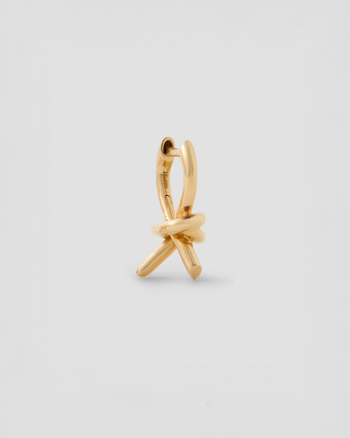 Knot Micro Huggie earring - worn look | gold huggie earrings