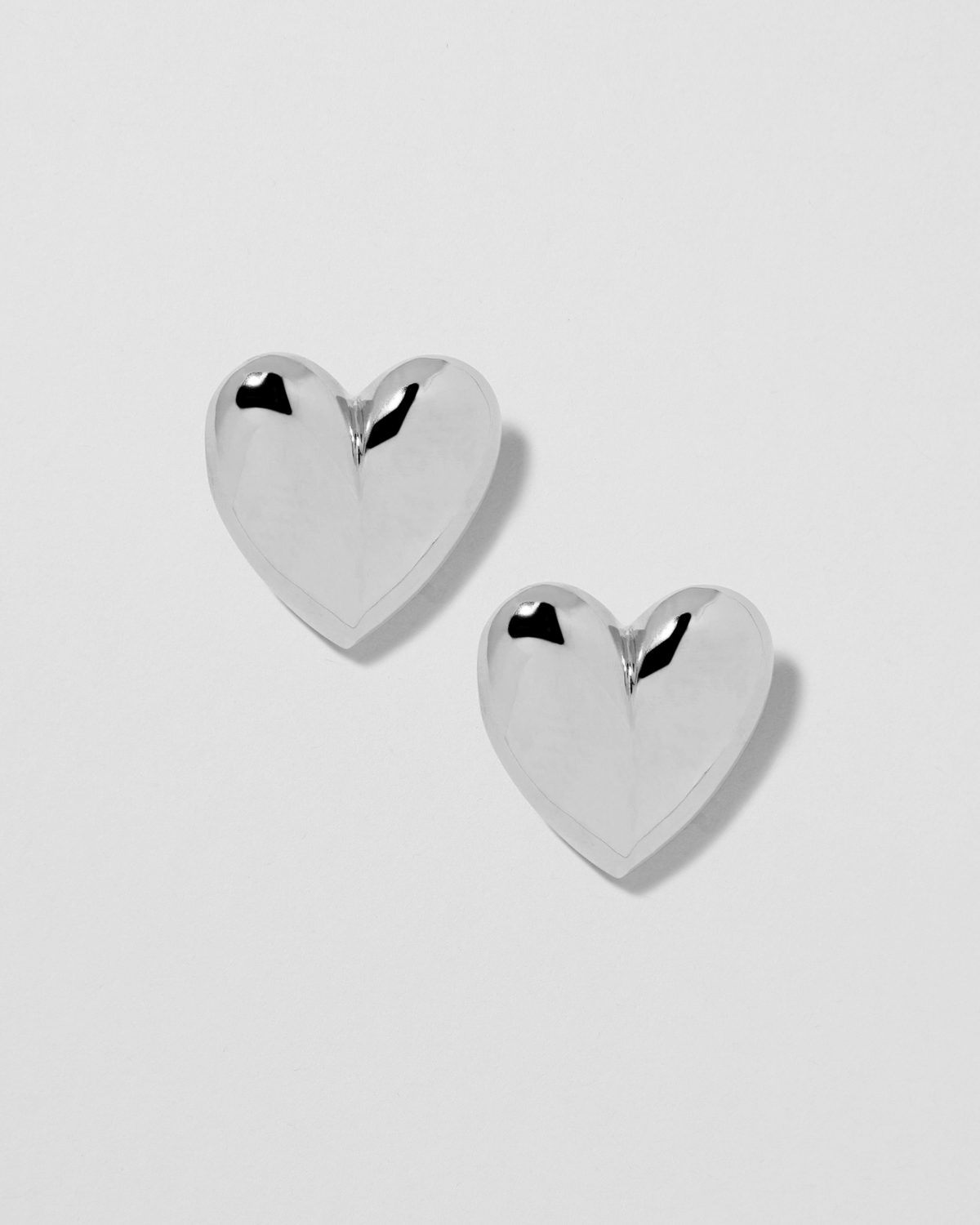 Small Puffy Heart Earrings earring - alternate angle | womens gold earrings