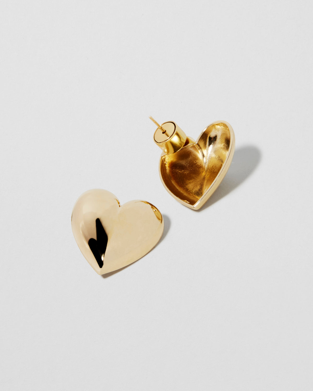 Small Puffy Heart Earrings earring - styled on model | womens gold earrings