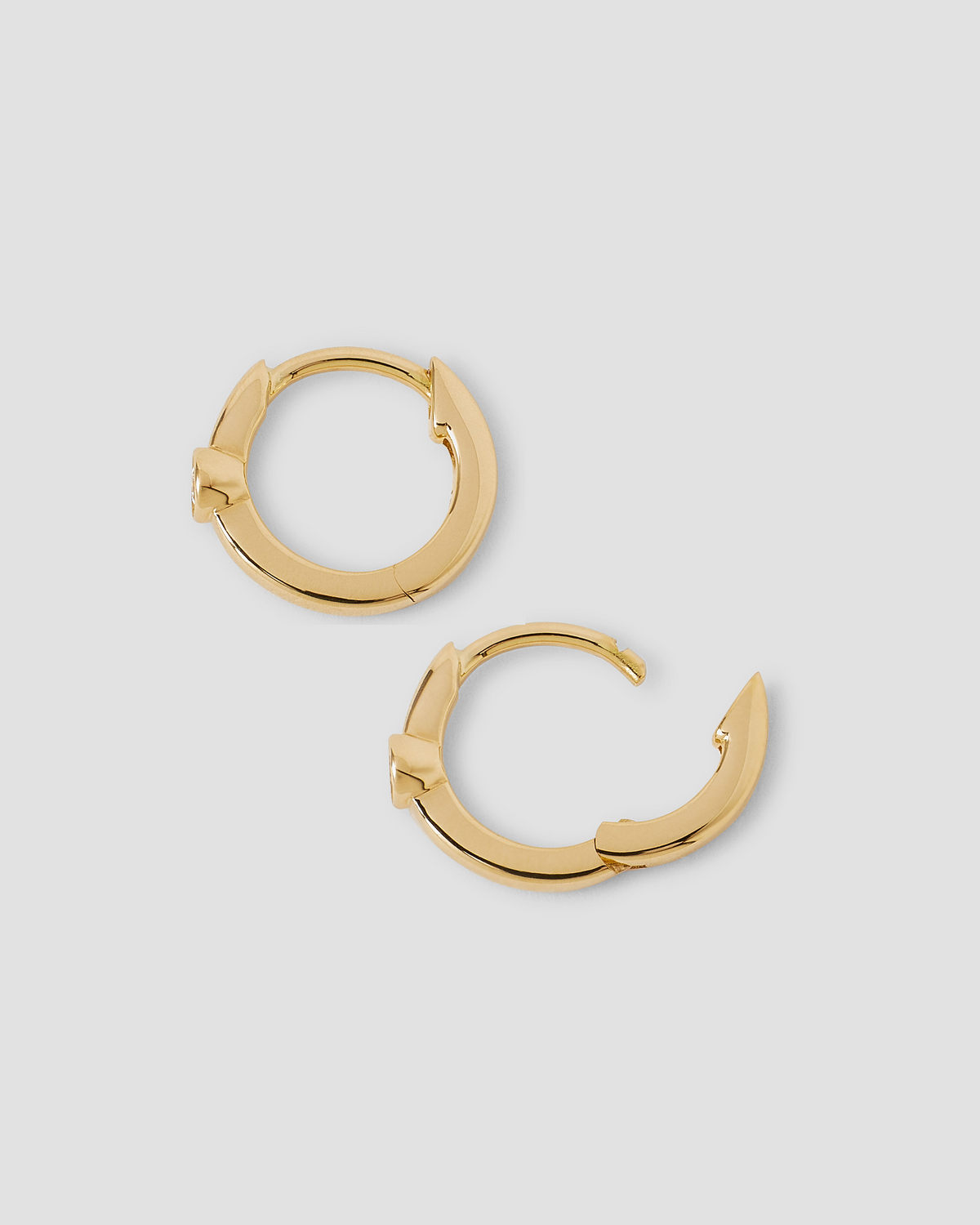 18K Essential Single Stone Tiny Huggie gold earring - back view | diamond huggie earrings