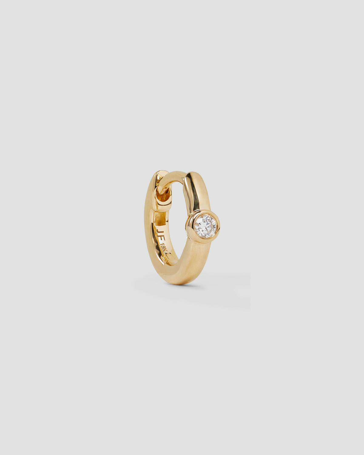 18K Essential Single Stone Tiny Huggie gold earring - side view | diamond huggie earrings